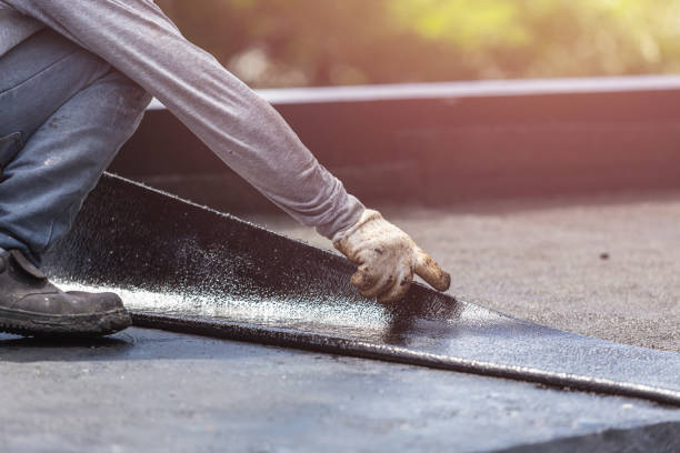 Professional Basement Waterproofing technician working in Willard, OH
